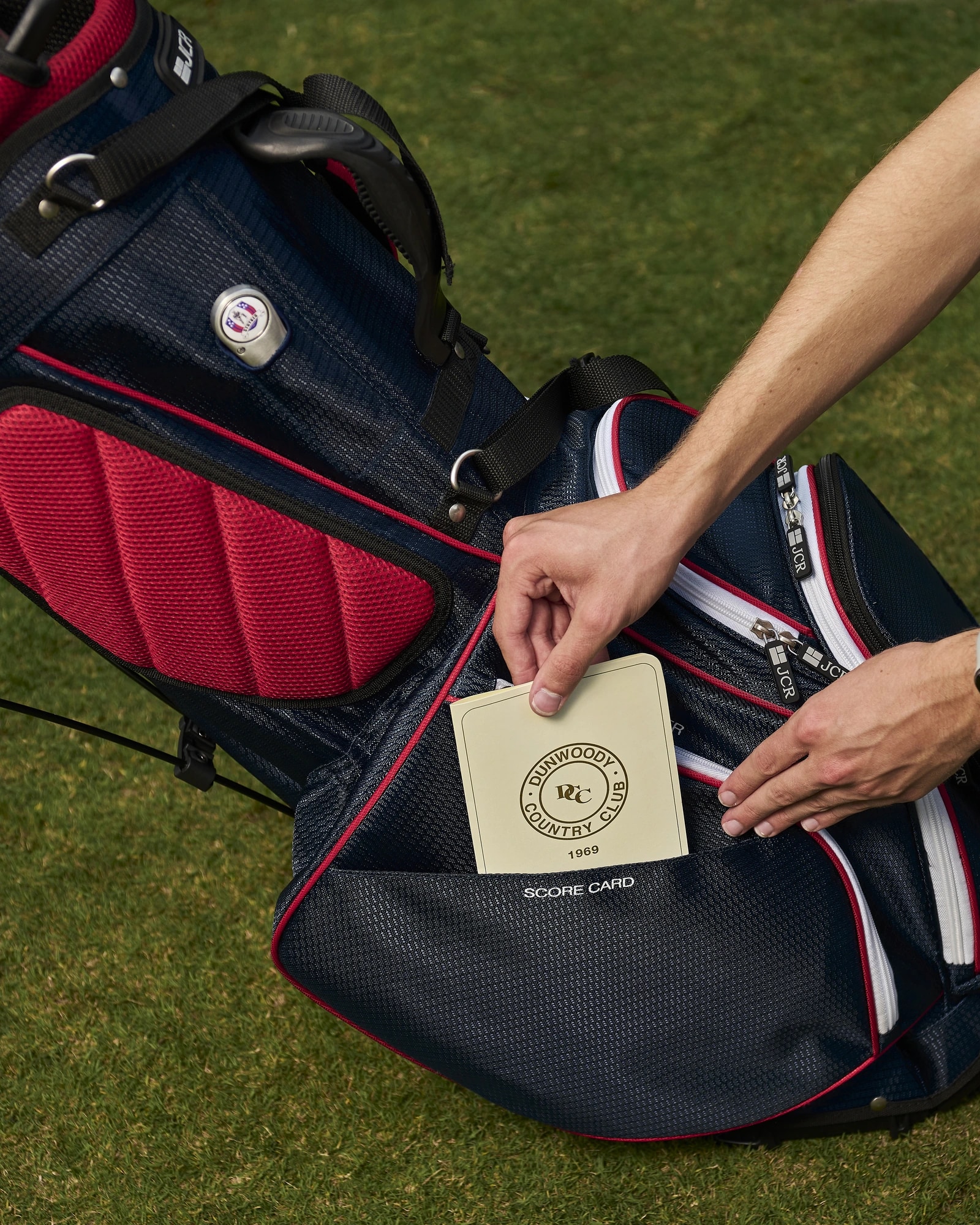 The JCR DL550s stand bag — a scorecard tucked into the organized pocket